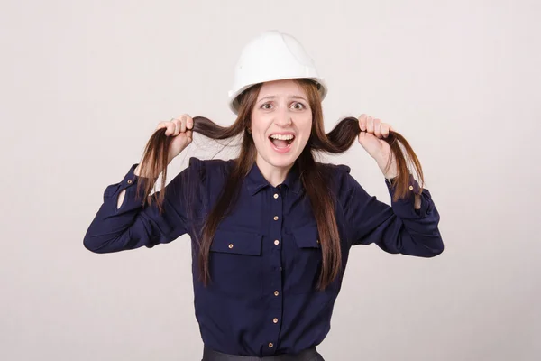 Young girl a helmet in shock — Stock Photo, Image