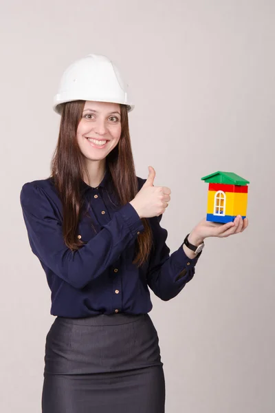 Jovem menina bonita como uma nova casa — Fotografia de Stock