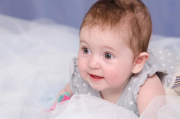 Six-month baby girl in crib — Stock Photo, Image