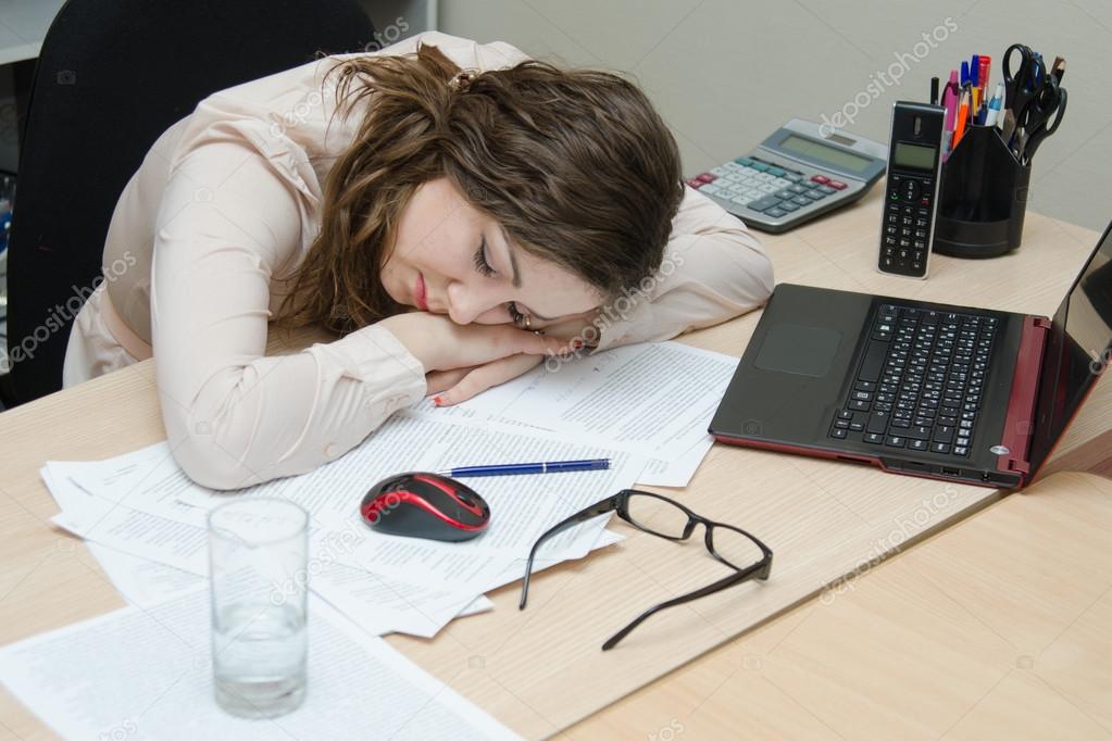 ffice worker asleep on the job in office