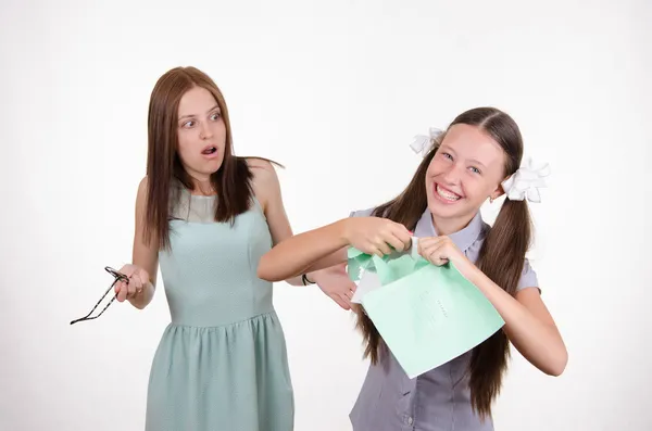 Schoolgirl rips his notebook — Stock Photo, Image