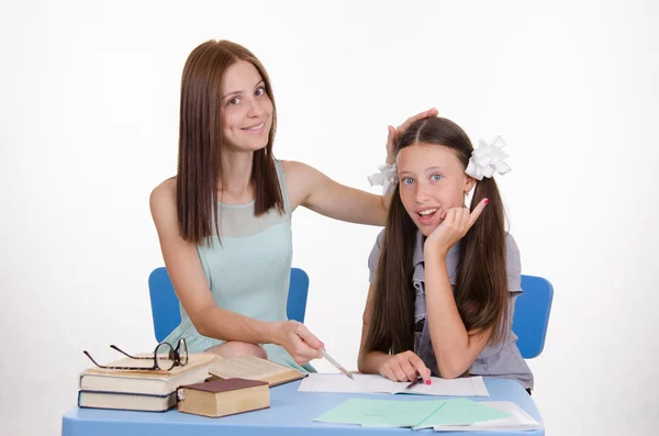 Teacher and student decide to homework — Stock Photo, Image