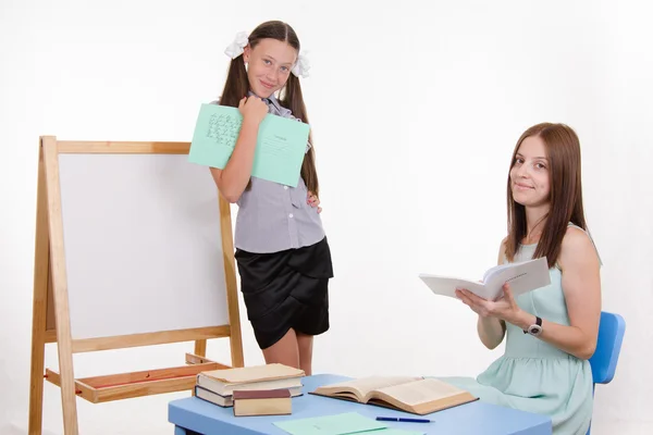 The teacher puts top five in student diary — Stock Photo, Image