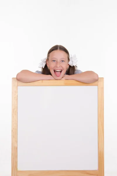 Teen girl with an advertising stand — Stock Photo, Image