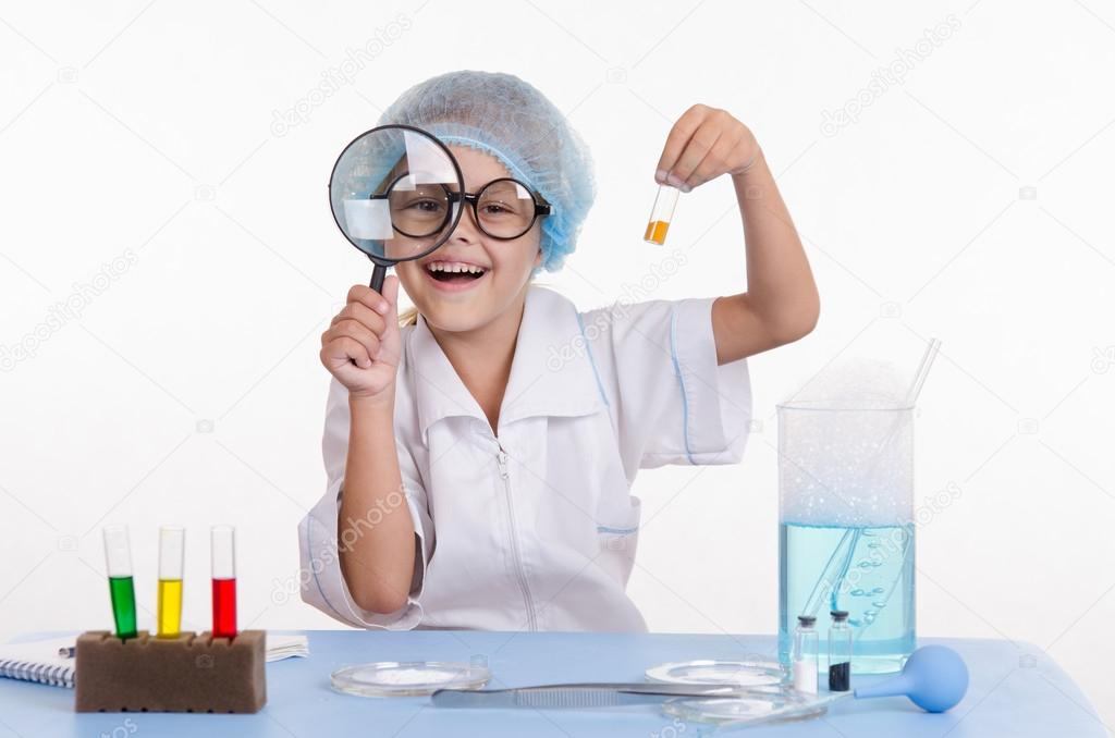 Chemist with the powder and a magnifying glass