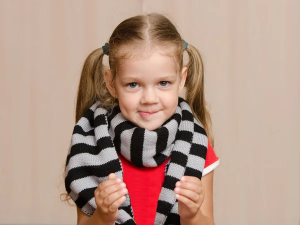 Girl with sore throat is holding a certain object — Stock Photo, Image