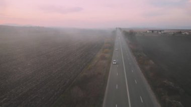 Farm Land Road Sunset Reveal Orbit Right Drone Aerial View