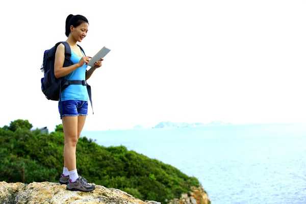 Woman hiker use tablet pc — Stock Photo, Image