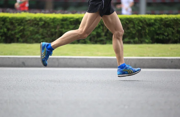 Atleta corriendo en la maratón internacional de Shenzhen 2013 — Foto de Stock