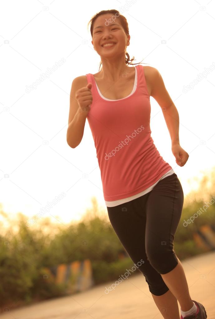 Woman runner running