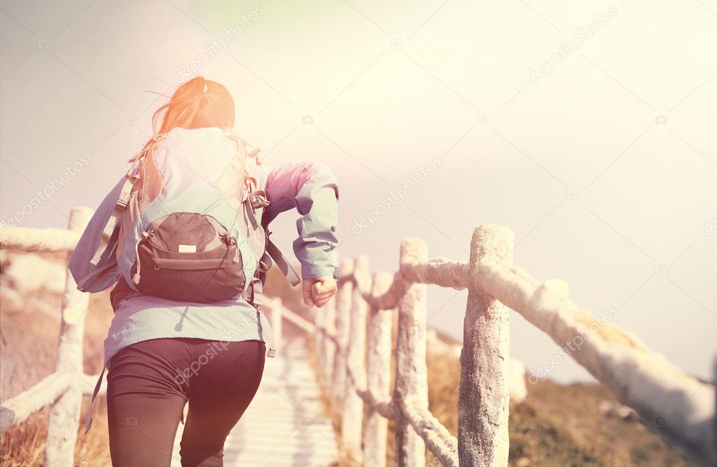 Hiking woman climbing