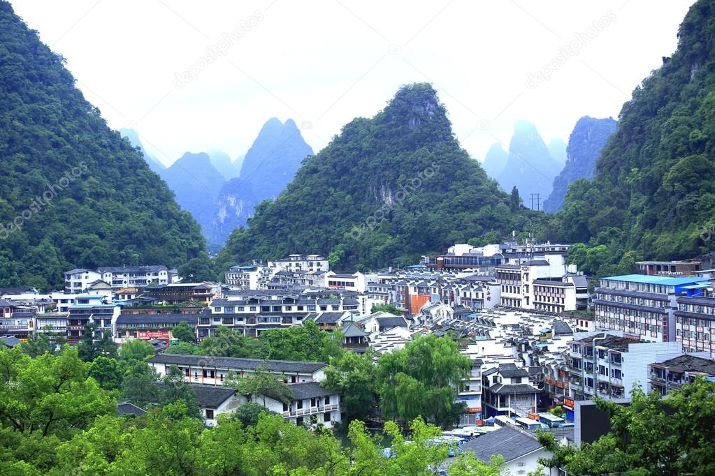 Buildings and mountain landscape