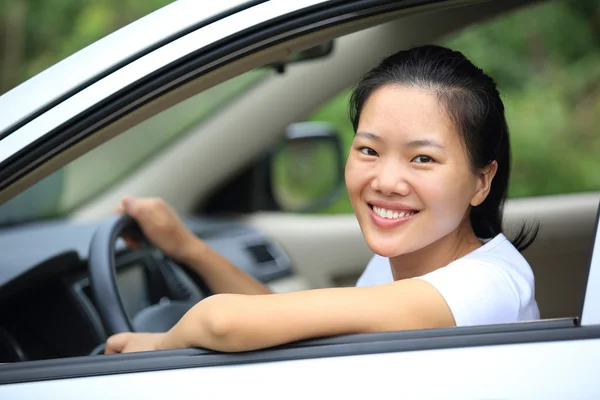 Woman driving a car — Stock Photo, Image