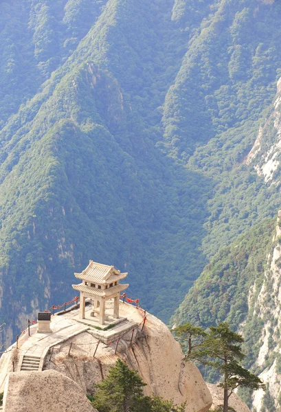 Stone pagoda built at the stone cliff — Stock Photo, Image