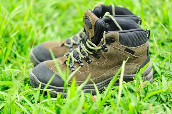 Boots in a grass — Stock Photo, Image