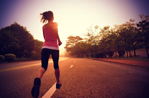 Runner athlete running at road — Stock Photo, Image