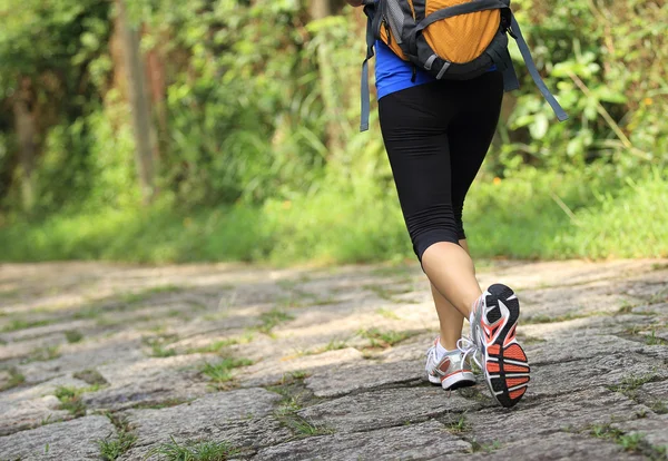 Runner athlete running on sunrise road — Stock Photo, Image