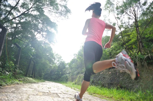 Runner athlete running at tropical park — Stock Photo, Image