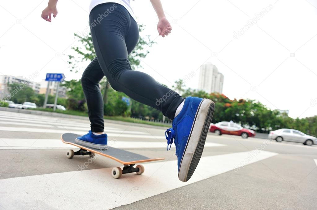 Speeding skateboarding woman