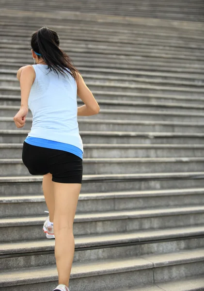 Runner athlete running on stairs — Stock Photo, Image