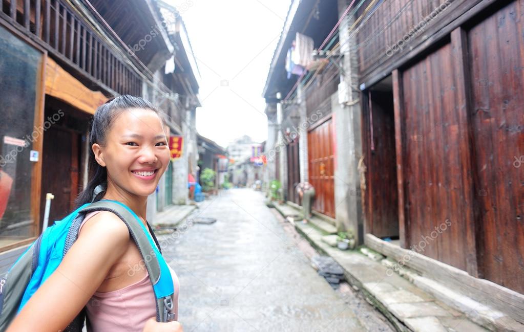 Woman tourist at xingping ancient town in guilin