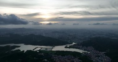drone view of the modern asian city with lake