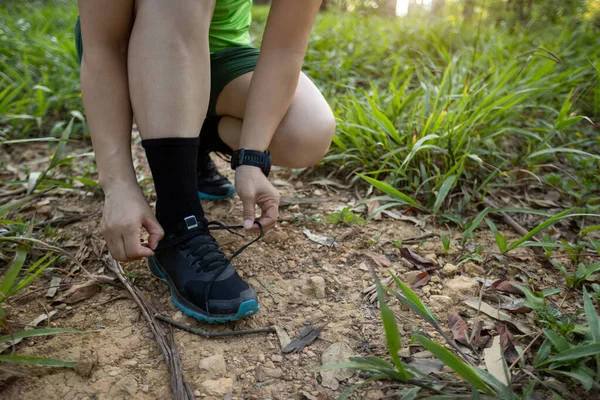 Woman Trail Runner Tying Shoelace Forest — Stockfoto