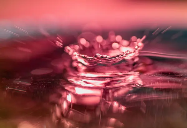 Waterdruppel Roze Wazig Achtergrond — Stockfoto