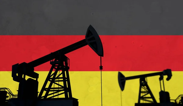 Oil and gas industry background. Oil pump silhouette against germany flag. 3D Rendering — Foto de Stock