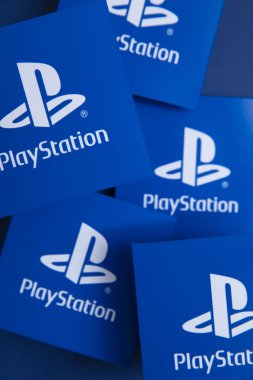 LONDON, UK - July 2022: Sony playstation logo against a blue background. Playstation is a video game brand.