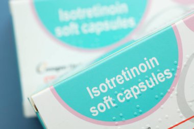 LONDON, UK - August 2022: packs of isotretinoin or roaccutane tablets used to treat severe acne.