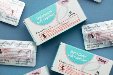 LONDON, UK - August 2022: packs of isotretinoin or roaccutane tablets used to treat severe acne.