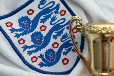 LONDON, UK - August 2022: Three lions national emblem badge on an England football team shirt.