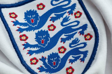 LONDON, UK - August 2022: Three lions national emblem badge on an England football team shirt.