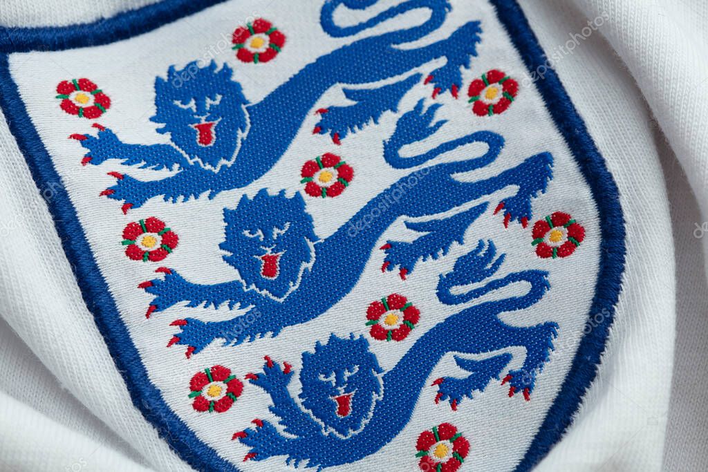 LONDON, UK - August 2022: Three lions national emblem badge on an England football team shirt.