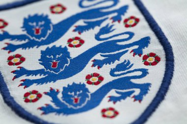 LONDON, UK - August 2022: Three lions national emblem badge on an England football team shirt.