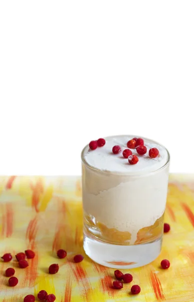Ice cream in a glass beaker with red berries — Stock Photo, Image