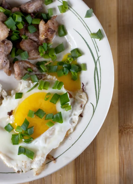 Fried egg with meat — Stock Photo, Image