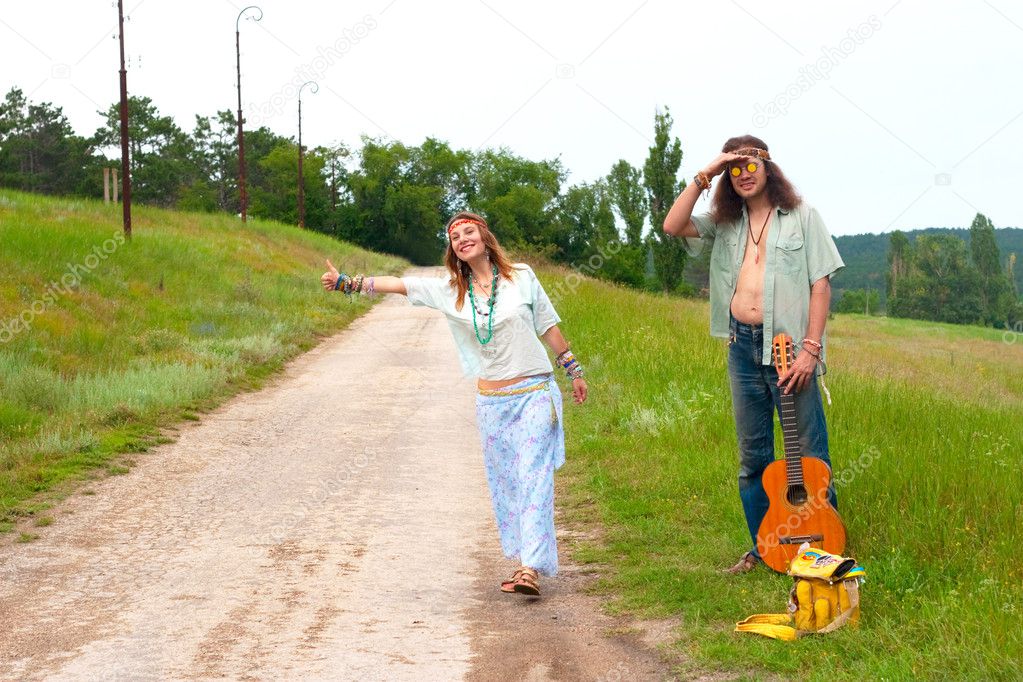 couple hitchhiker hippie on the road
