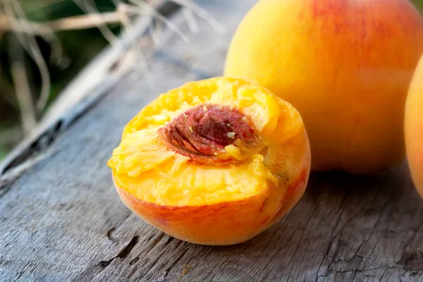 Half rich summer peach — Stock Photo, Image