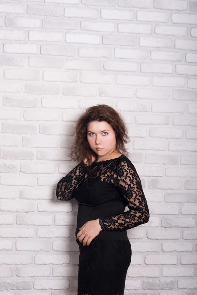 Attractive woman in black dress — Stock Photo, Image