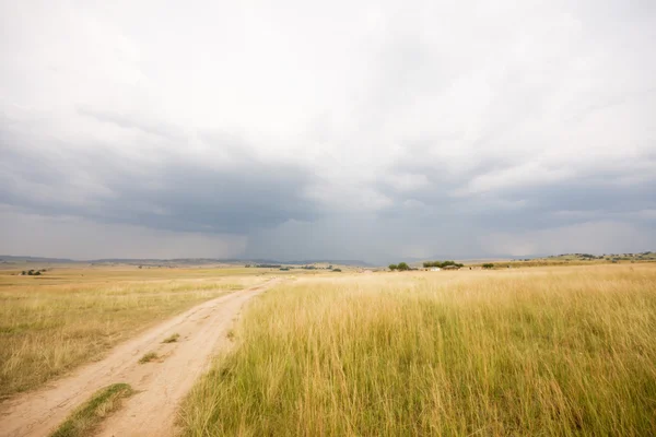 Stormy skies over farm land — Stock Photo, Image