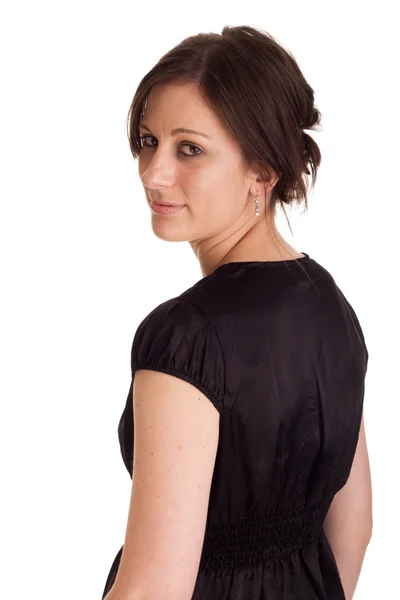 Mulher de negócios atraente olhando por cima de seu ombro — Fotografia de Stock