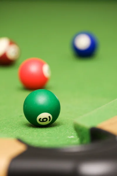 Pool balls on a green pool table — Stock Photo, Image