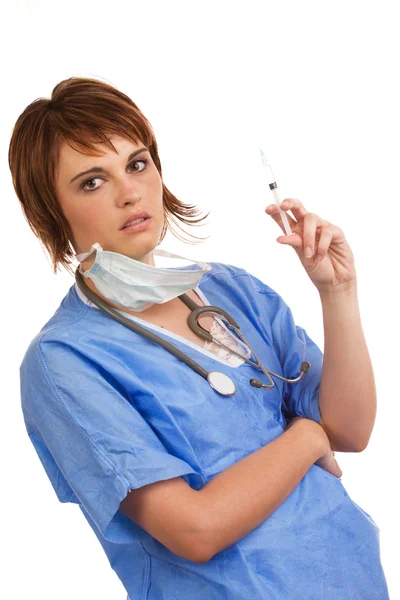 女护士举行一个填充的注射器 — 图库照片