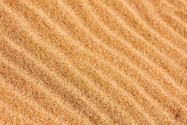 Wellenmuster im Sand des Strandes — Stockfoto