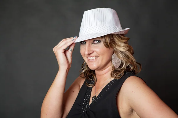 Young white woman wearing white pinstripe hat — Stock Photo, Image