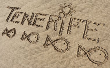 Tenerife, sand writing on the beach of El Papagayo clipart