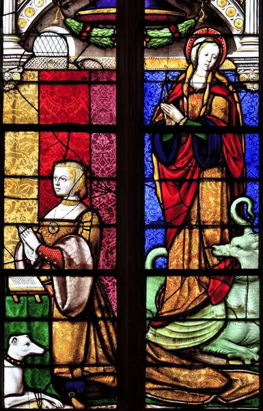 The stained glass window of Margarete and St Margaret Of Antioch at Brou church in Bourg-en-Bresse — Stock Photo, Image
