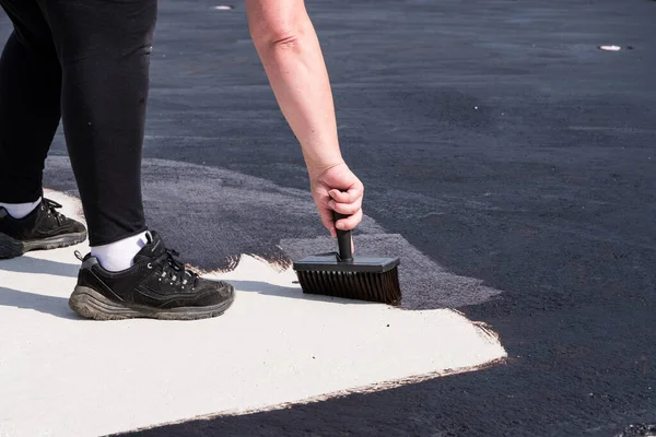 Construction Worker Paints Waterproof Concrete Ceiling Bitumen Paint Close Craftsman — Stock Photo, Image